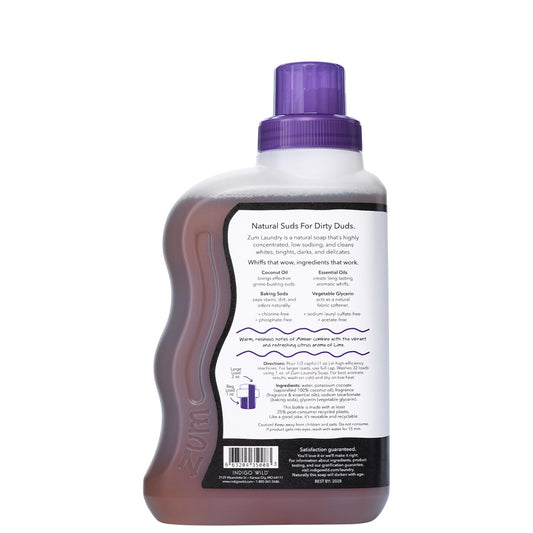 Back of Amber-Lime Laundry Soap bottle with black and white label and purple cap.