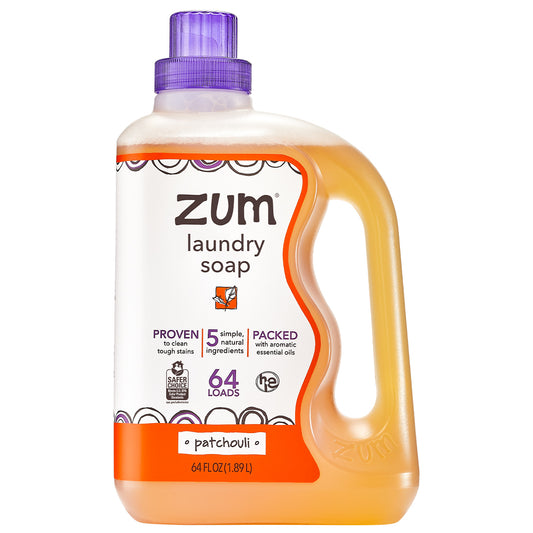 Plastic bottle with wavy edge, handle and screw top cap containing patchouli scented laundry soap liquid