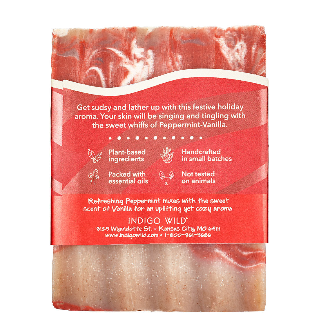 The back side of a red and white swirled Zum Bar with red peppermint-vanilla label wrapped around.