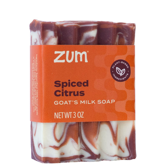 Red, orange, and white swirled Bar Soap With orange label wrapped around the middle.