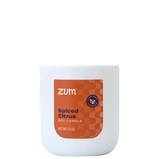 10 oz. Soy Candle in a white container with orange label on front.