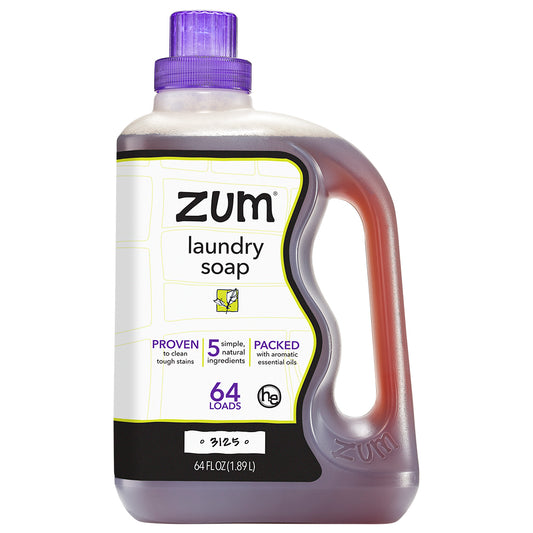 3125 zum laundry soap in a clear bottle with dark liquid and purple cap.