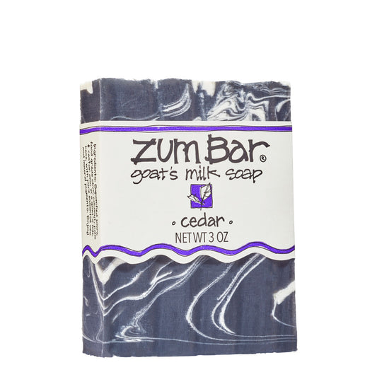 Labeled Cedar scented Zum Bar Soap with white and black colored swirls.