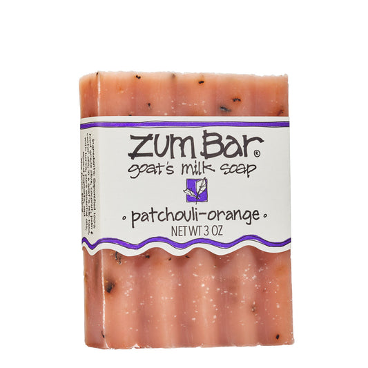 Labeled patchouli-orange scented Zum Bar Soap with speckled orange coloring